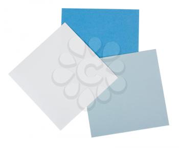 Close-up of three blank adhesive notes