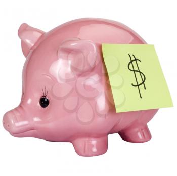 Dollar sign adhesive note stuck on a piggy bank