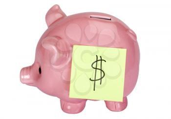 Dollar sign adhesive note stuck on a piggy bank
