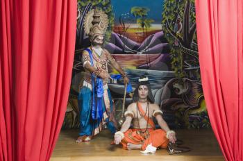 Two stage artists dressed-up as Rama and Ravana the Hindu mythological characters