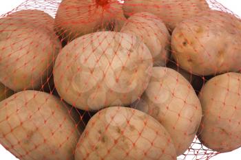 Close-up of raw potatoes in a net bag