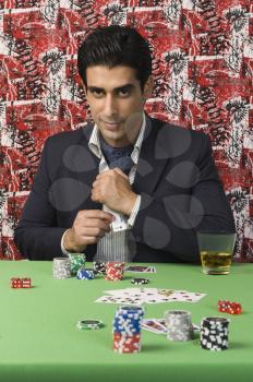 Portrait of a man gambling in a casino