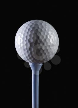 Close-up of a golf ball on a tee