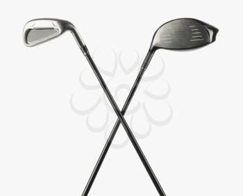 Close-up of two golf clubs