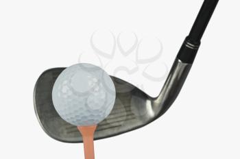 Golf club with a golf ball and a tee