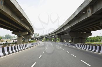 Road in the middle of overpasses, National Highway 8, New Delhi, India