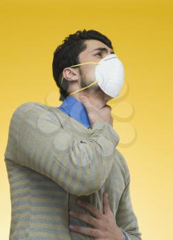Man wearing a pollution mask