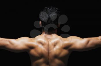 Rear view of a man exercising