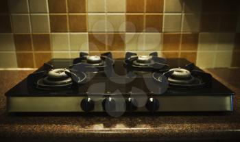 Gas stove on a kitchen counter