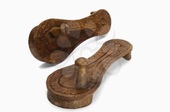 Close-up of a pair of Paduka a traditional Indian wooden footwear worn by Hindu priests and Brahmins