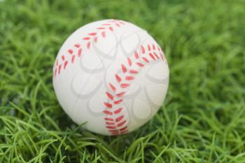 Close-up of a baseball on grass