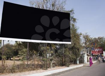 Billboard on the roadside, Ahmedabad, Gujarat, India