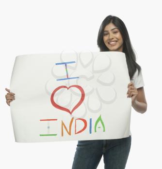 Woman holding a placard with text I Love India written on it