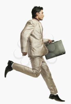 Businessman running with a briefcase