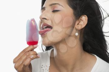 Woman licking an ice cream