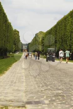 Tourists in a golf cart, Chateau de Versailles, Versailles, Paris, France