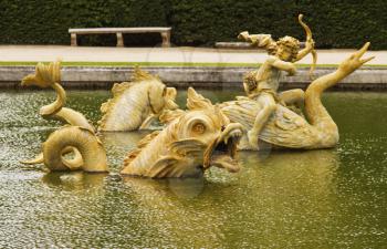 Statues in a pool, Chateau de Versailles, Versailles, Paris, France