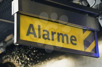 Alarm sign at a railroad station, Paris, France