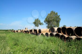 old gas pipes on field