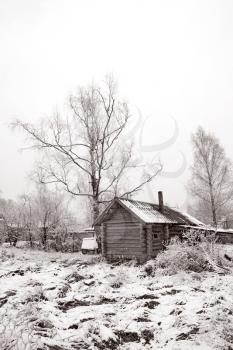 old rural house in snow