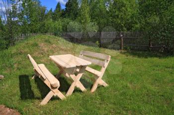 wooden furniture in summer park