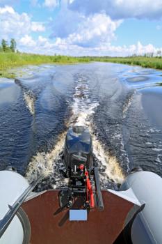 motor boat on small river