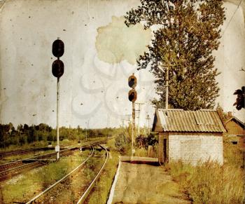 rural railway station on aging paper