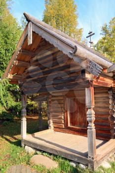 aging wooden chapel in village