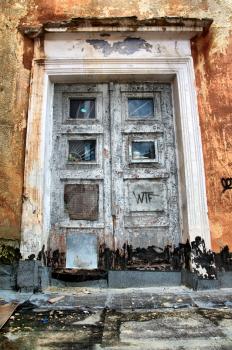 aging door in destroyed house