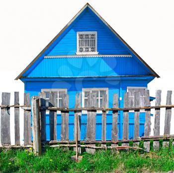 old wooden fence  against blue building