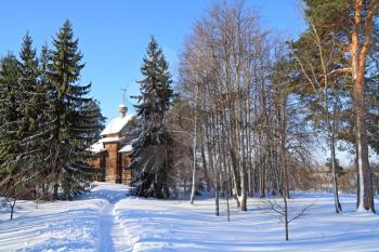 wooden chapel in winter wood