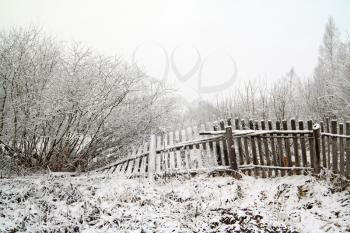 old fence in snow