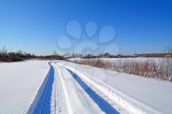 snow road near winter of the villages