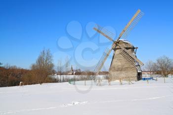 aging mill on snow field