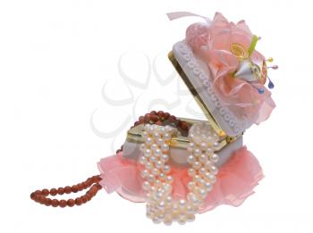 Open box with beads and pearls on a white background. 
                   
