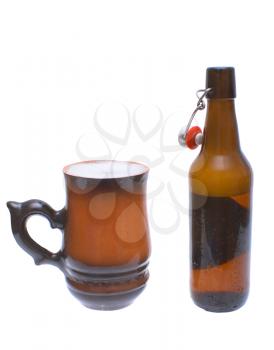 Mug and a bottle of beer on a white background. 
                   