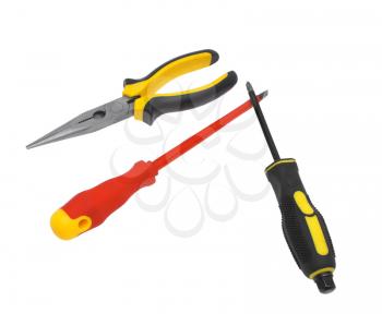 Screw-drivers, flat-nose pliers on a white background.              