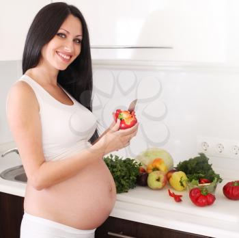 pregnant woman in kitchen