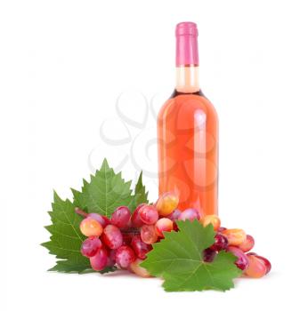 grapes with leaf and rose wine bottle isolated on white