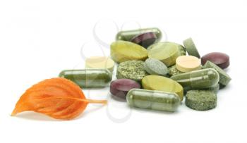 vitamins, pills, tablets and leaf