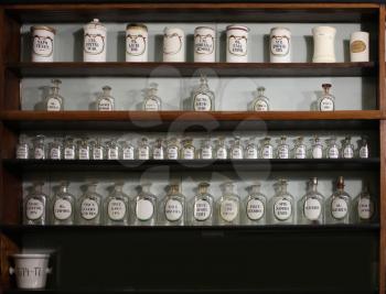 Shelves with medicines in retro pharmacy