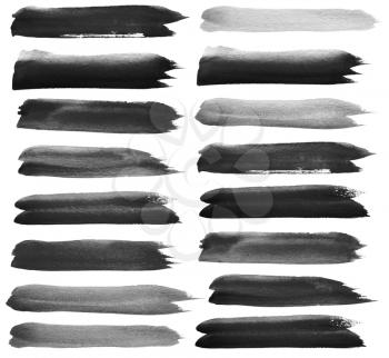 Set of black watercolor brush strokes. Isolated on white.

