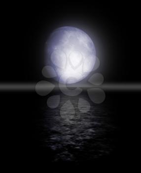 The full moon in the night sky reflected in water