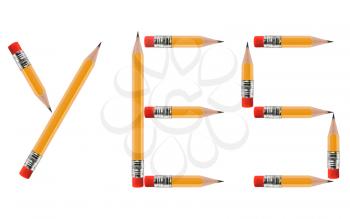 short Pencils isolated on white background arranged to spell Yes.