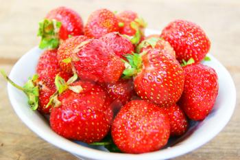 Ripe berry strawberry on plate.Juicy ripe berry strawberries