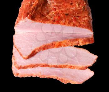 Piece of meat of ham on black background is insulated