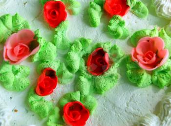 Decoration from flower  roses  on festive cake