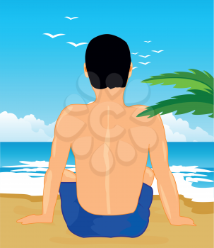 Tropical coast with beach and lonesome sitting man
