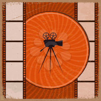 Vintage orange background with the silhouette of movie camera and film