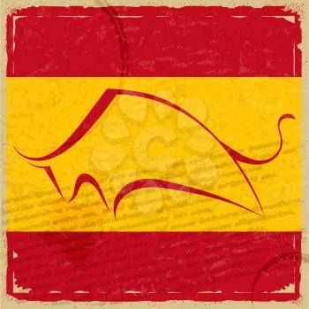 Grunge Spanish flag with the silhouette of a bull